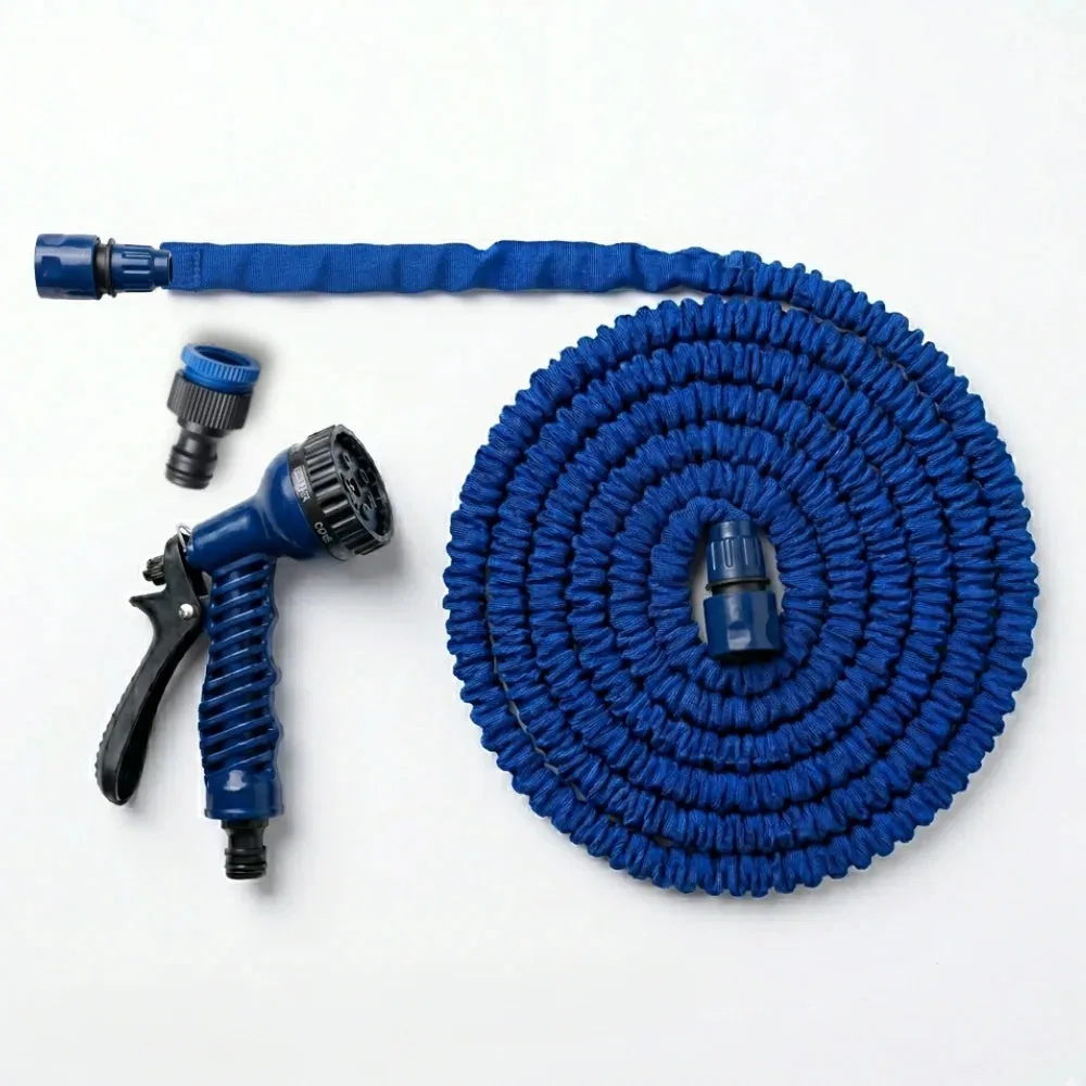 Full Expandable Magic Garden Hose set laid out showing the coiled expandable hose, spray gun, and tap connector